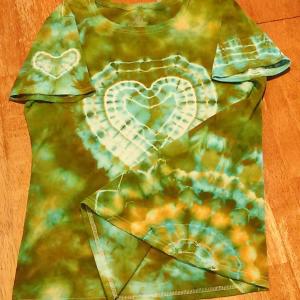 A T-shirt with a heart pattern on it